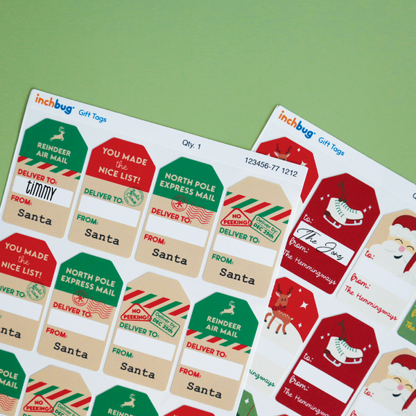 A set of personalized holiday gift tags with various designs including Santa Claus and reindeer, each with a space for a name and address.