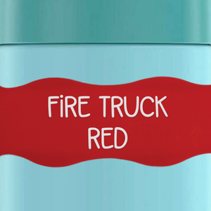 close up of InchBug Orbit Labels® Personalized Water Bottle Label - Fire Truck Red on a green container