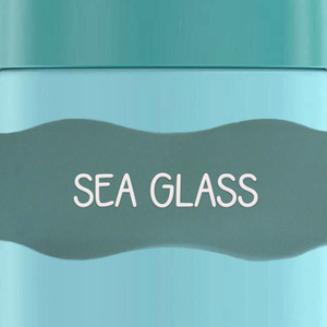 close up of InchBug Orbit Labels® Personalized Water Bottle Label - Sea Glass on a green container
