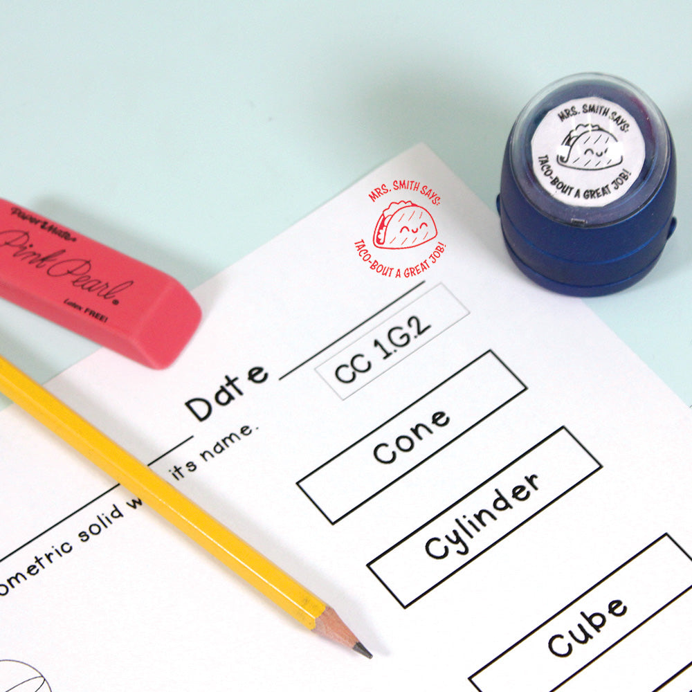 Dark blue personalized teacher stamp with self-inking base, with a unique design featuring a teacher's name and a phrase 'Taco-bout a great job!'.