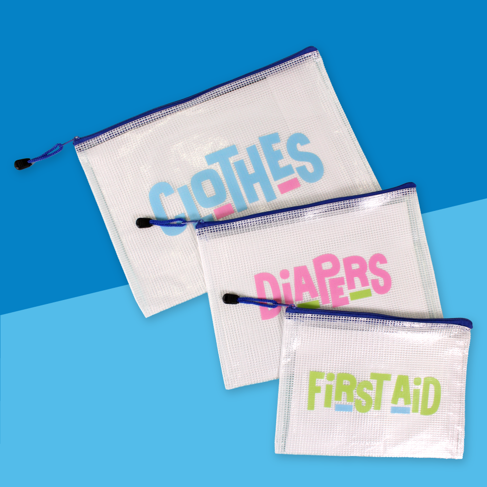 The InchBug 3-pack Diaper Bag Organizers placed on a blue two-tone background, one marked 'CLOTHES', one 'DIAPERS', and one 'FIRST AID'.