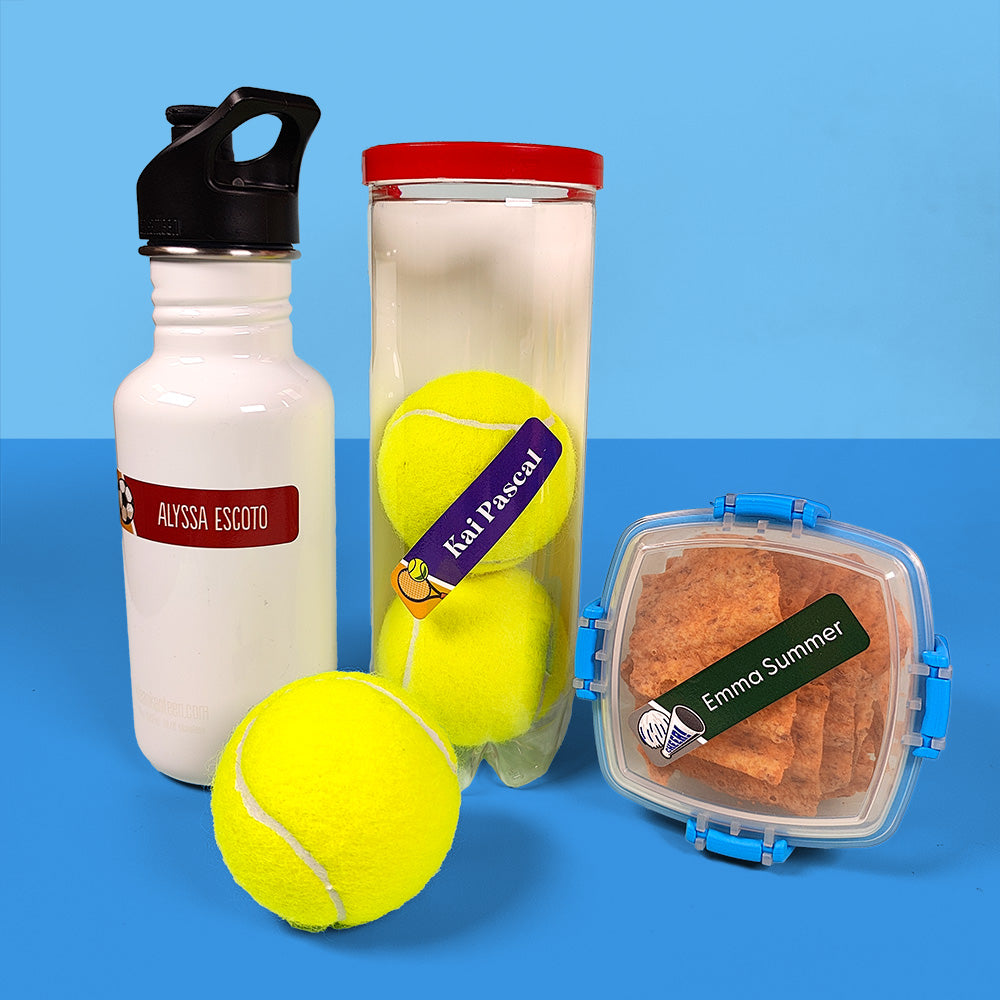 A collection of items labeled with personalized name labels, including a water bottle, tennis balls, and a food container, displayed against a blue background.