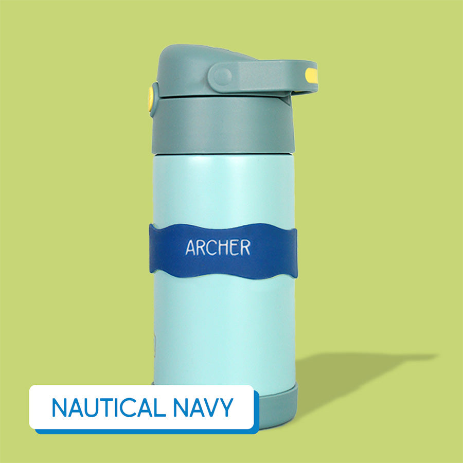 Blue-green tumbler on a lime green background, labeled with InchBug Orbit Labels® Personalized Water Bottle Label - Nautical Navy
