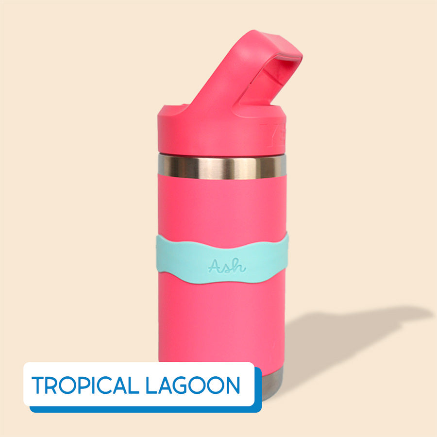 Pink thermos with turquoise band on a beige background, labeled with InchBug Orbit Labels® Personalized Water Bottle Label - Tropical Lagoon