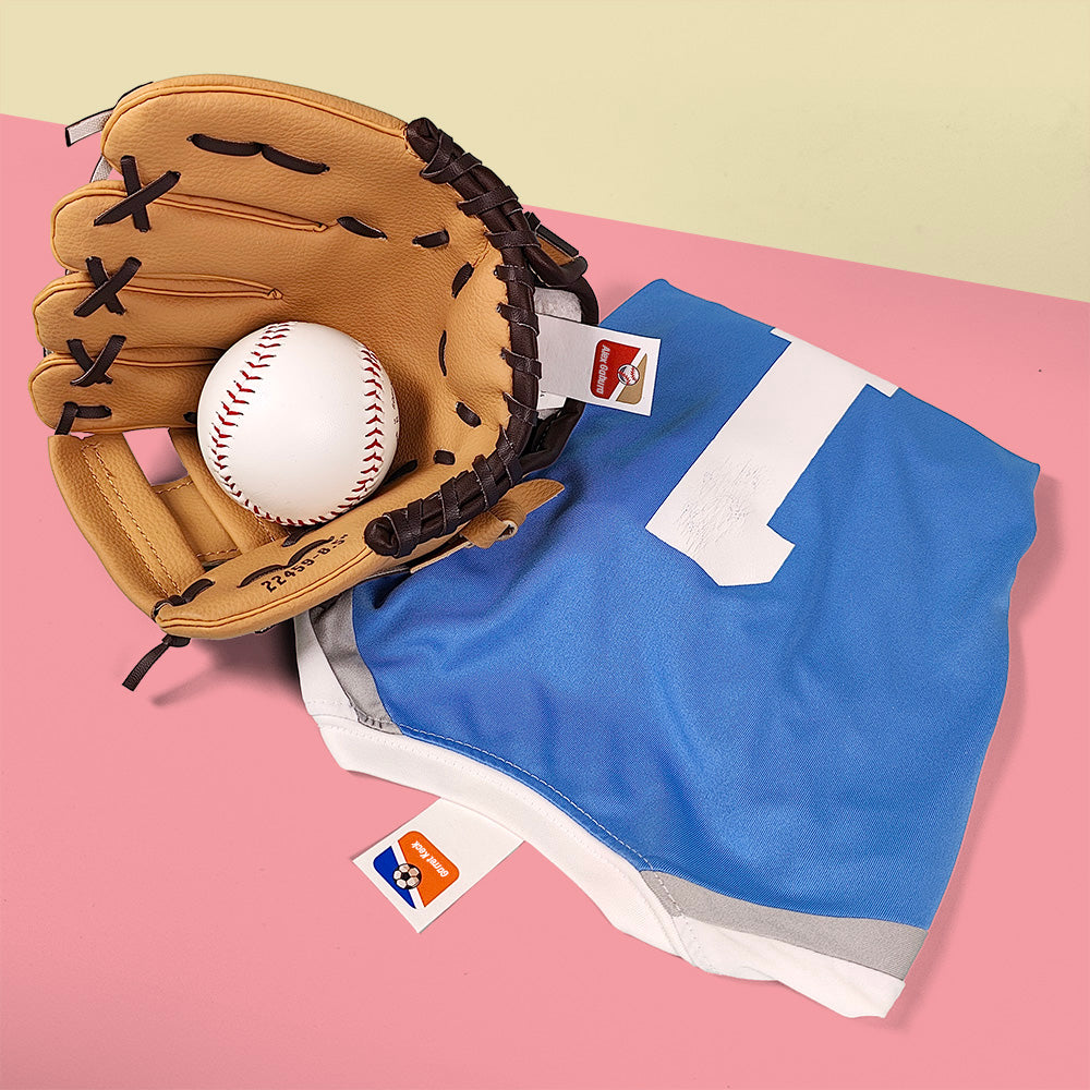 A baseball and a blue piece of clothing with InchBug clothes tags attached to them, presented on a two-tone background.