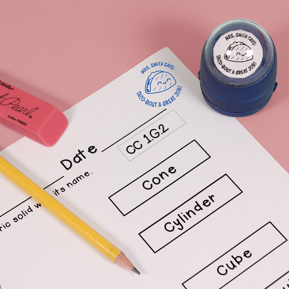 Blue personalized teacher stamp with self-inking base, with a unique design featuring a teacher's name and a phrase 'Taco-bout a great job!'.
