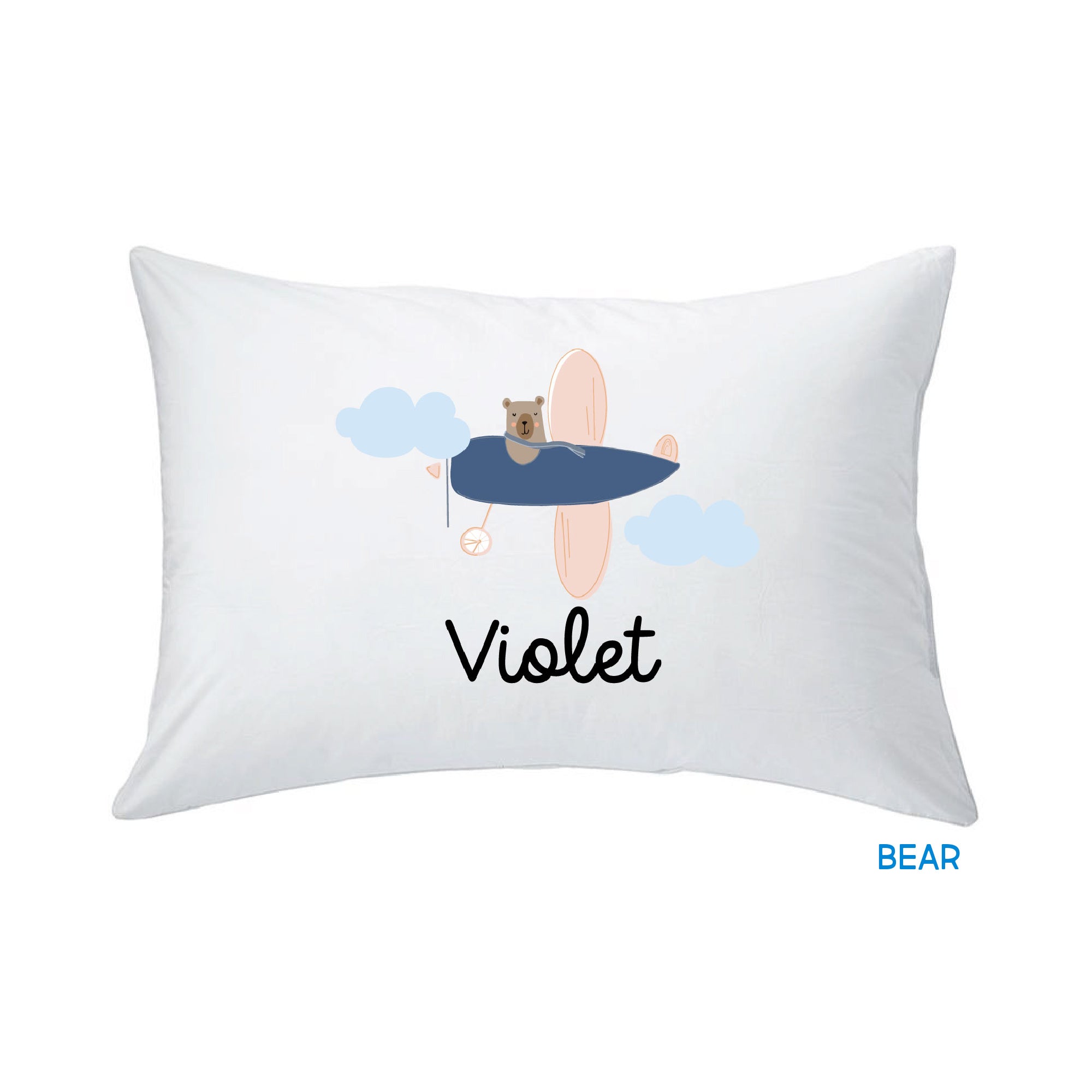 white pillow with bear print design against a white background, customized by InchBug with the name "Violet"; small text in blue reads "BEAR"