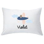A white pillowcase with the name 'Violet' printed on it, featuring a design with a bear and clouds.