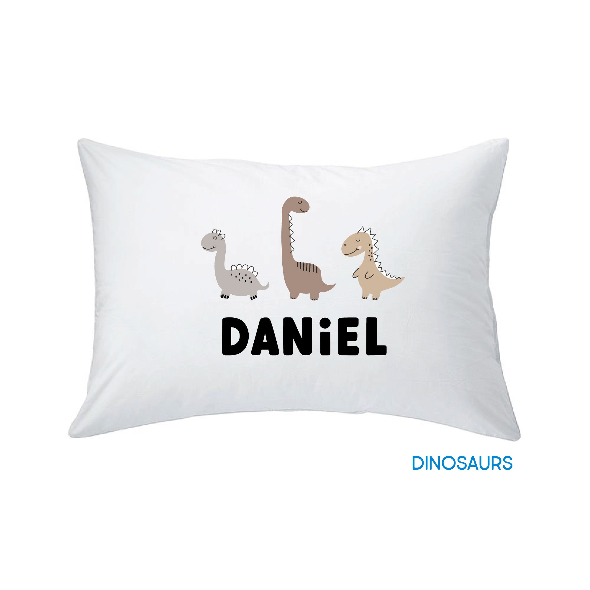 white pillow with rainbow print design against a white background, customized by InchBug with the name "Daniel"; small text in blue reads "DINOSAURS"