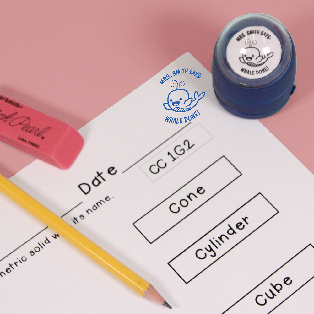Blue personalized teacher stamp with self-inking base, with a unique design featuring a teacher's name and a phrase 'Whale done!'.