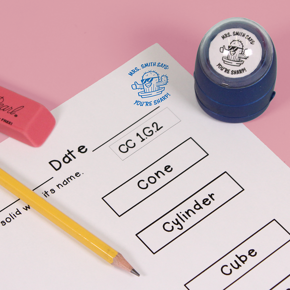 Blue personalized teacher stamp with self-inking base, with a unique design featuring a teacher's name and a phrase 'You're sharp!'.