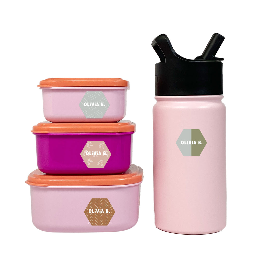 pink water bottle with black cap, pink food containers with orange lids stacked on top of one another; all are labeled with InchBug hexagon sticker name labels