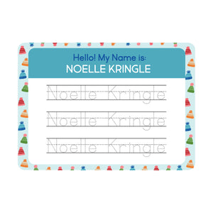InchBug personalized handwriting board with beanie designs, text reads "NOELLE KRINGLE"