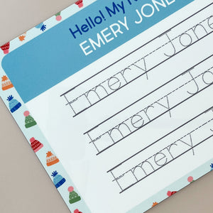 close-up look of the InchBug personalized handwriting board with beanie designs