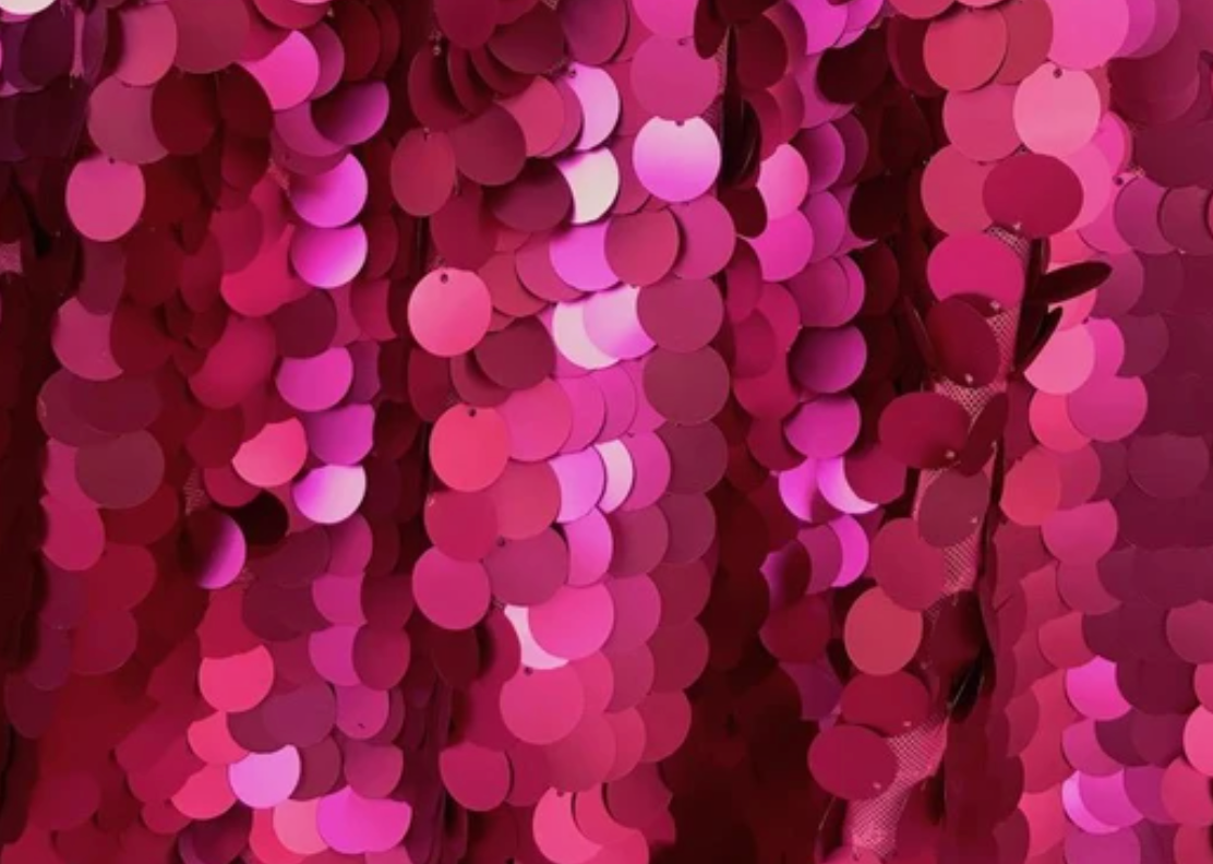 extreme close-up on the red sequins