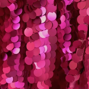 extreme close-up on the red sequins