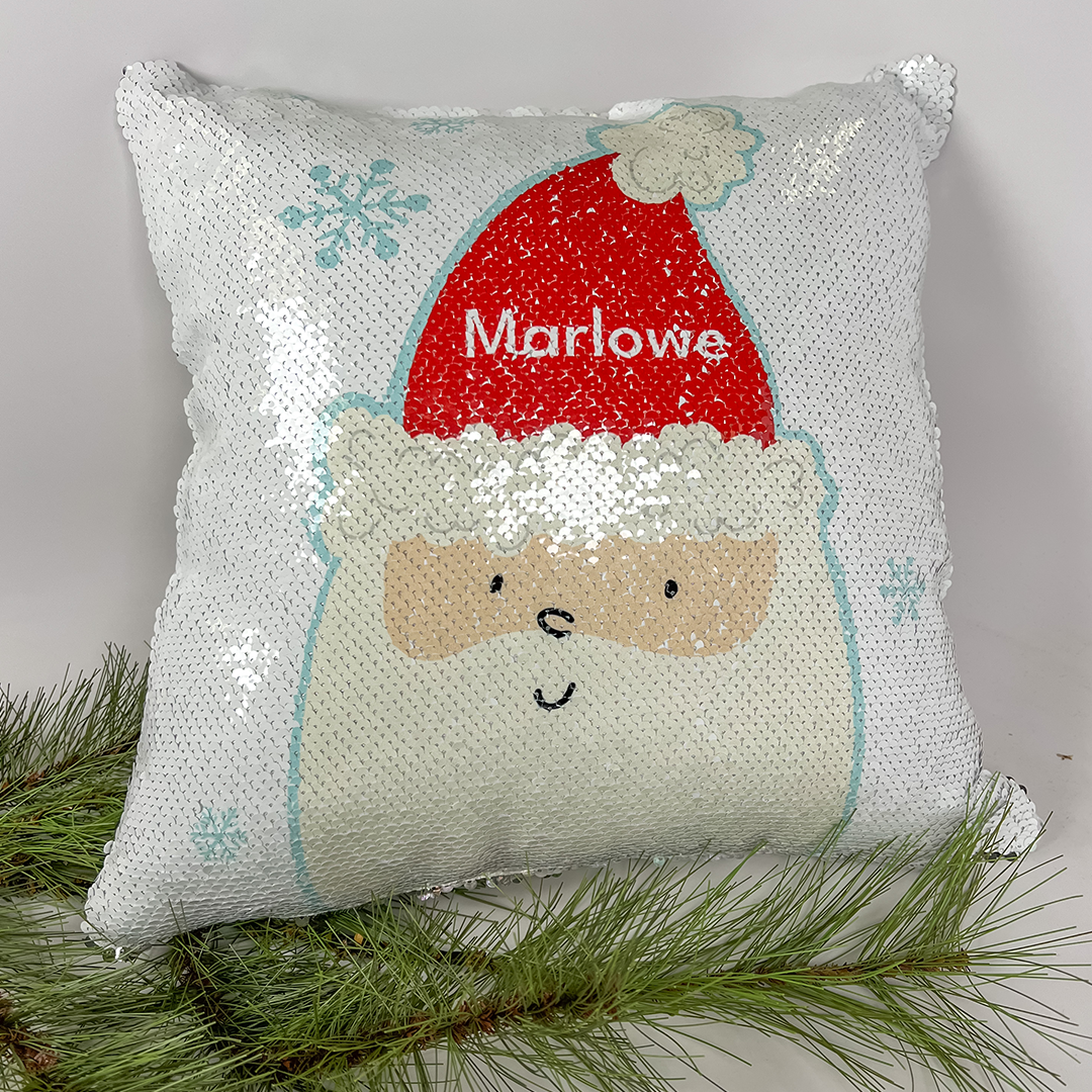 white sequined pillow with Santa design, customized with the name "Marlowe"