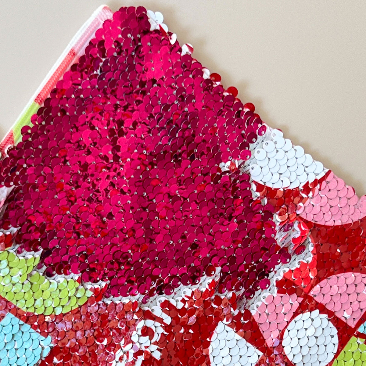 close-up view of the InchBug sequin pouch
